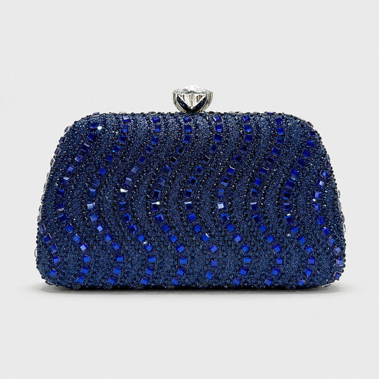 VALENORA Séraphine clutch bag in navy blue with a crystal wave pattern and a diamond-inspired snap closure.