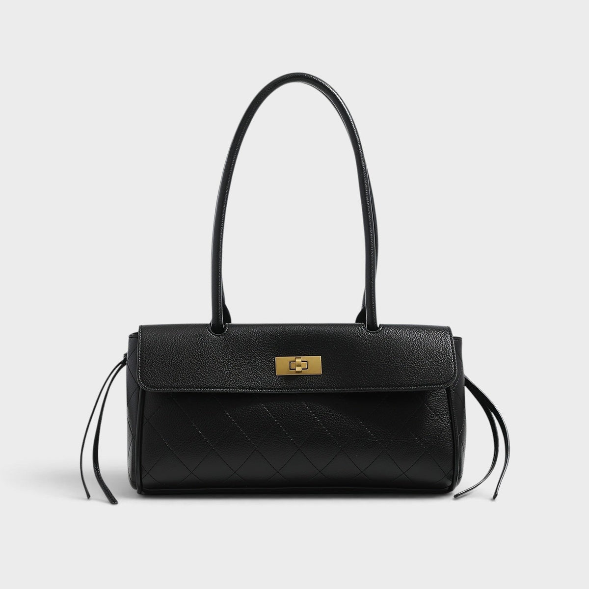 VALENORA Verancia black quilted shoulder bag with gold-tone turn-lock closure and side-tie detailing.