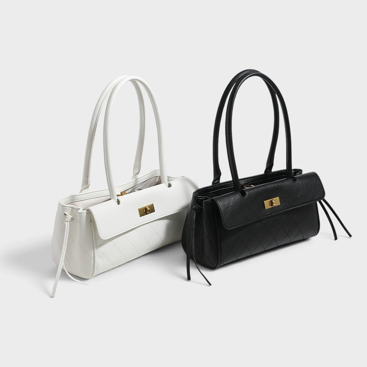 VALENORA Verancia shoulder bags in black and white with quilted texture, gold turn-lock closure, and side-tie detail.