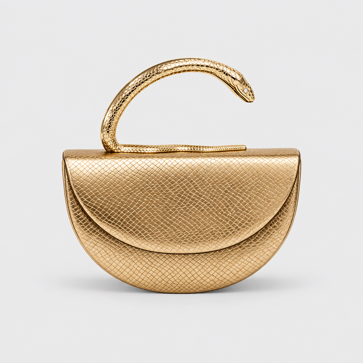 VALENORA Vipère handbag in metallic gold vegan leather with a sculptural coiled serpent handle and snakeskin texture.