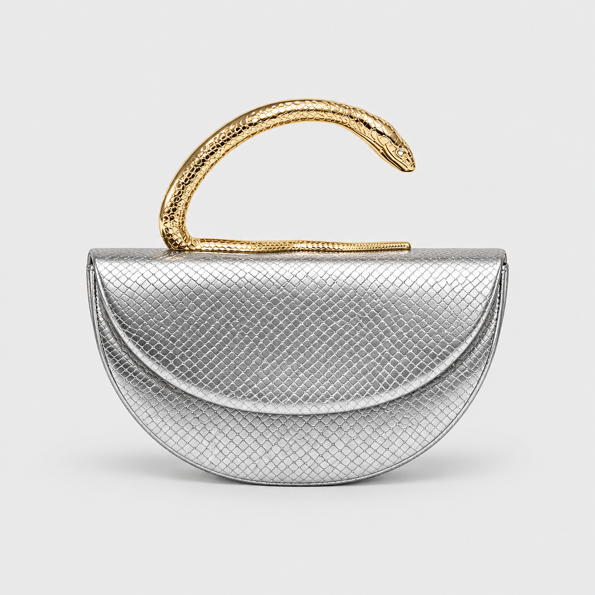 VALENORA Vipère handbag in metallic silver vegan leather with a sculptural gold serpent handle and snakeskin texture.