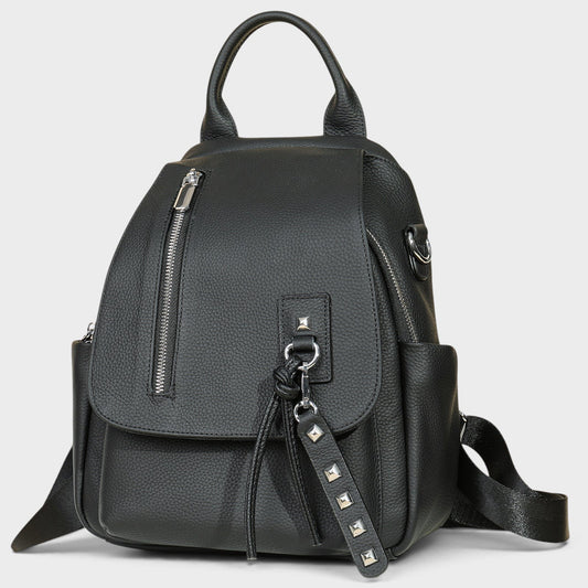 VALENORA Wren black leather backpack with silver stud detailing, front zipper pocket, and adjustable shoulder straps.