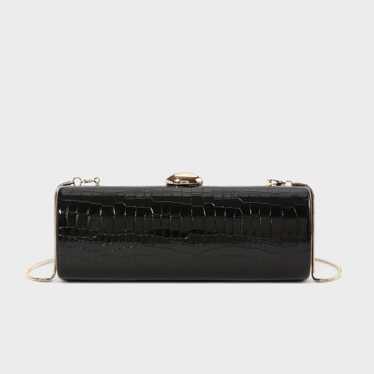 VALENORA Ysabel black croc-embossed vegan leather cylindrical clutch bag with a polished gold ball clasp and chain.